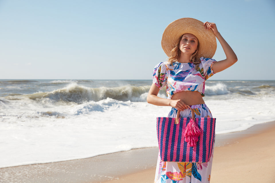 Model with Lido tote on beach