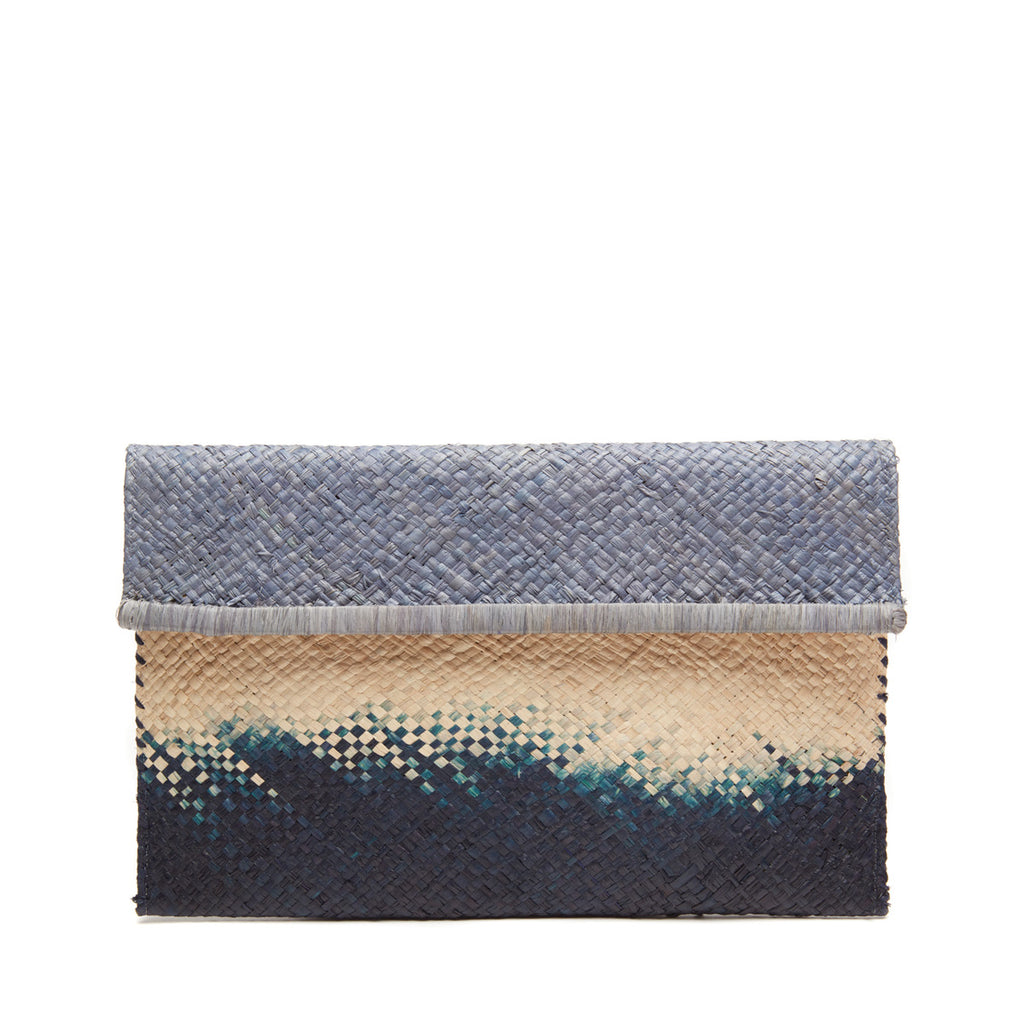 Dove, natural, navy colored ombre woven clutch with cotton lining and snap closure