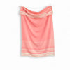 Woven cotton Turkish towel in shell pink on white