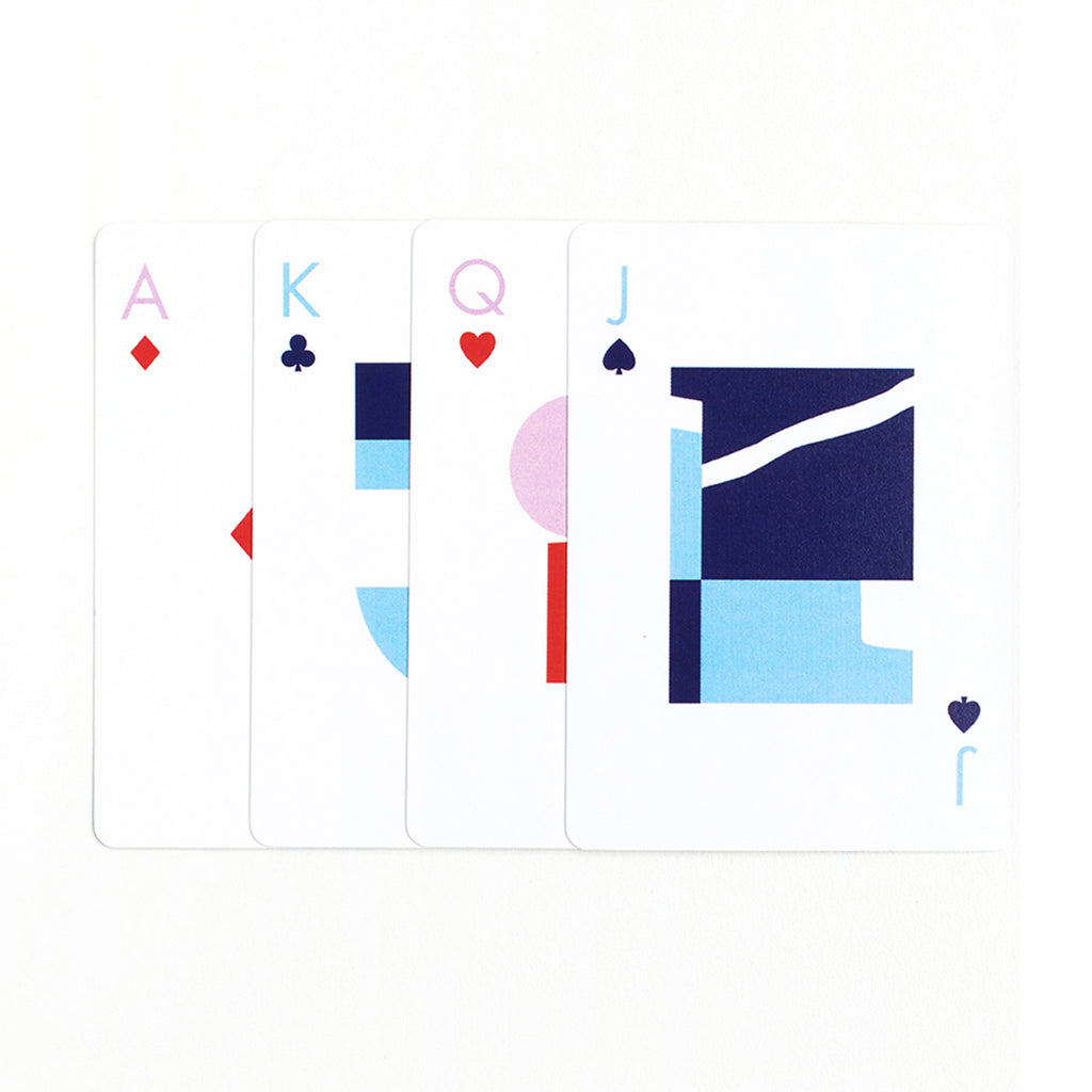 Four Assorted Playing Cards Face Up On White Background