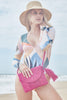 Model on beach wearing Naomi Pink