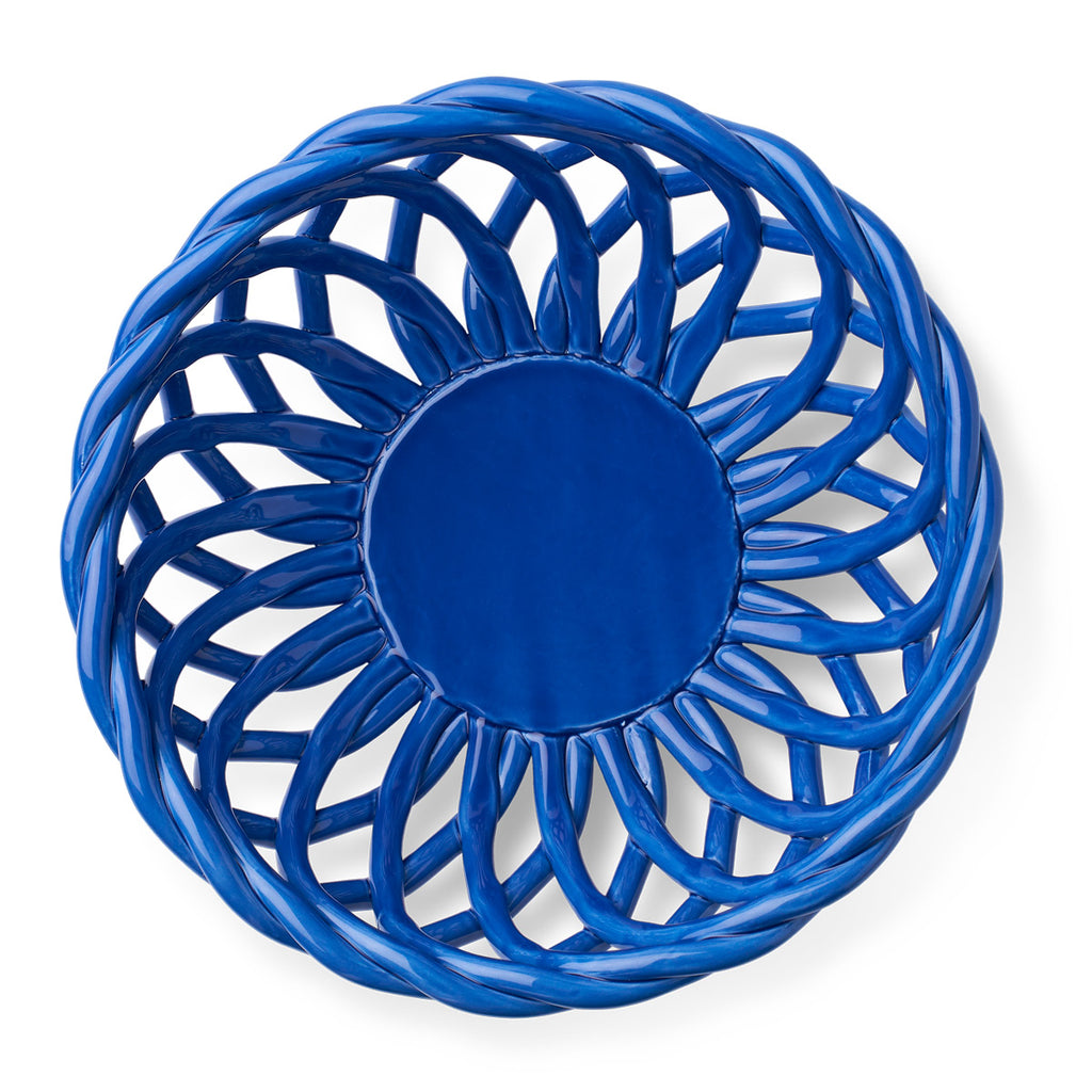 Overhead view of glazed ceramic basket in blue