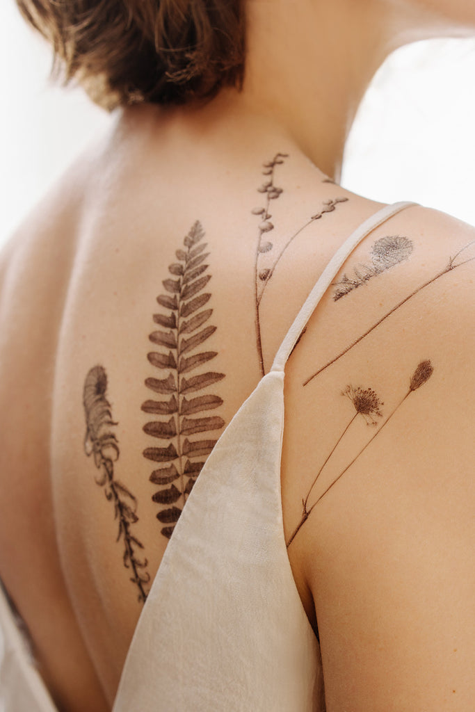 Model with Tattly Botanist tattoos