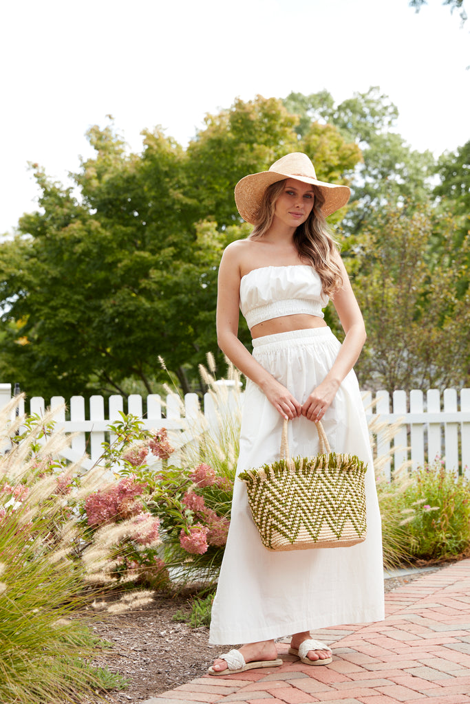 Model in garden with Bahia Emerald