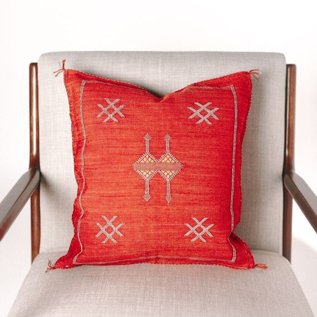 Red Cactus pillow on a chair