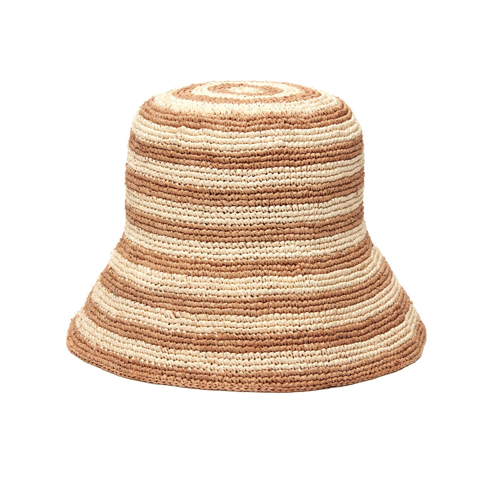 Eleni hat in Sand on white background