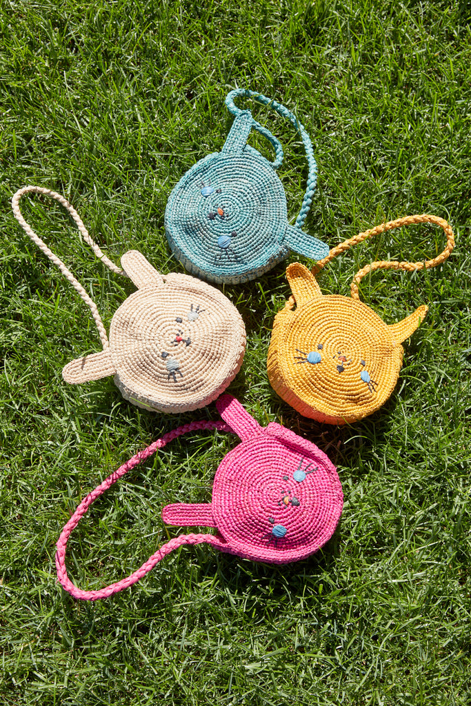Four bunny bags on grass