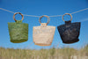 Three willow bags on a line