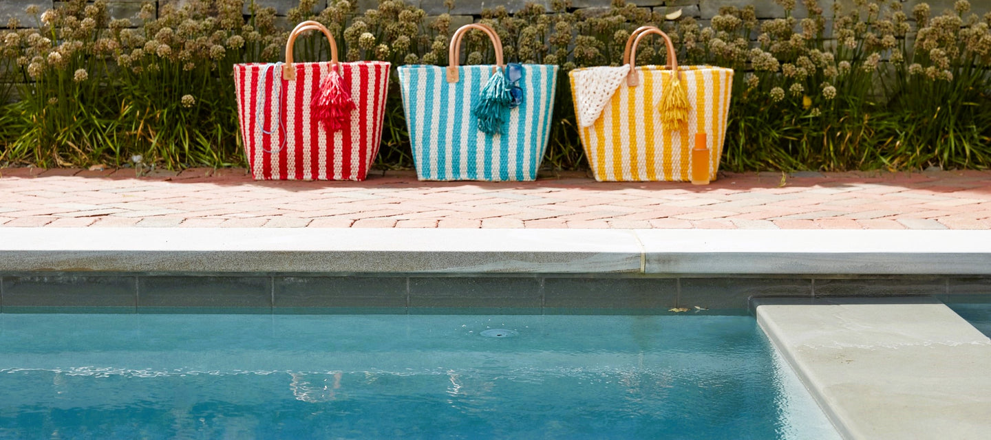 Three Lido Totes next to a pool