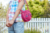 crop of child wearing Bunny bag in pink