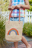 crop of a child wearing Rainbow tote in Natural