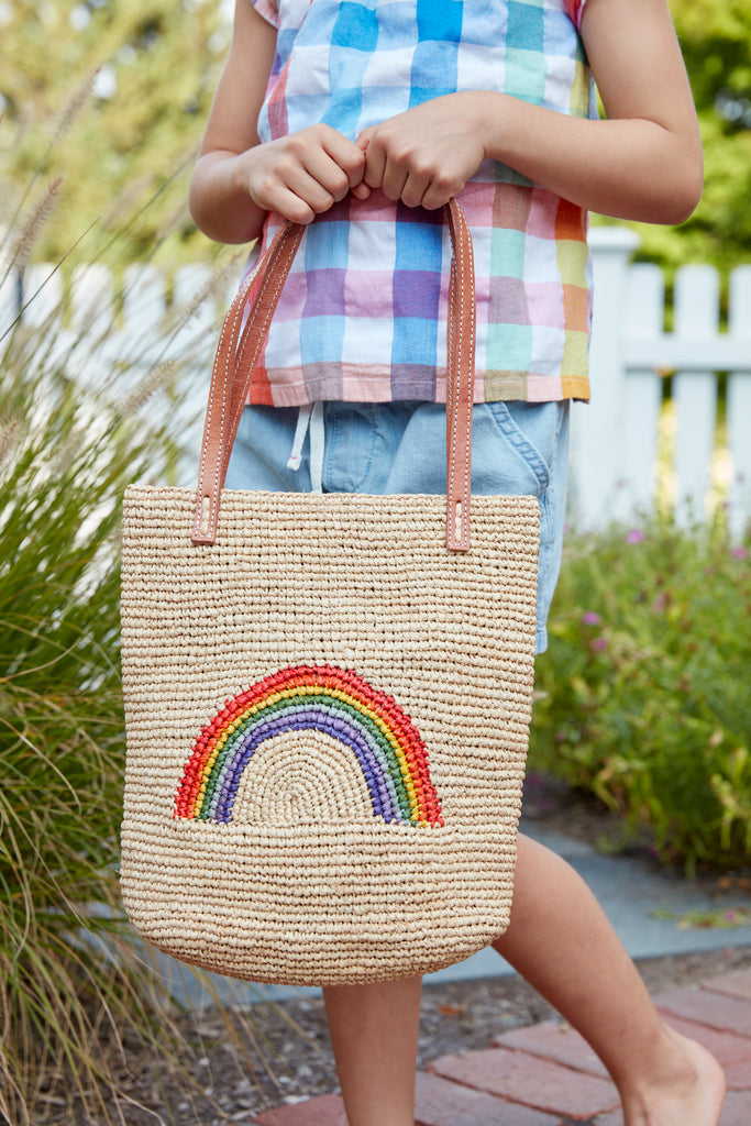 crop of a child wearing Rainbow tote in Natural