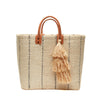 Natural sisal Marley tote with vertical navy pinstripes, leather handles and a natural raffia tassel