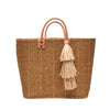 Sand colored Marley sisal straw beach tote with vertical navy pinstripes, leather handles and a natural raffia tassel