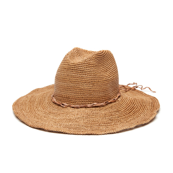 Mika hat in Sand on white background