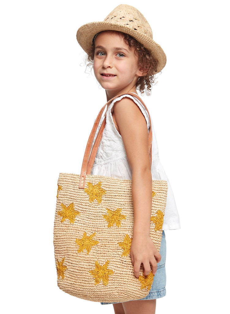 Model with Petite Soleil tote