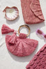 Zoe Pink with other clutches and accessories