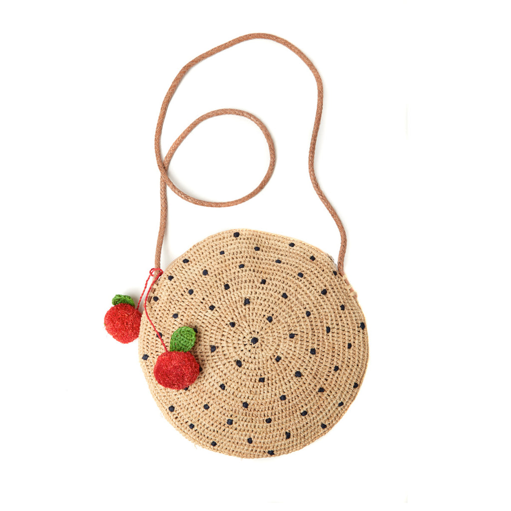 Natural with navy polka dot shoulder bag with leather strap, and cherry pom poms