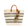 Multi colored woven sisal basket tote with pom poms & leather handles