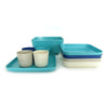 Blue and white and aqua plates and cups and trays stacked
