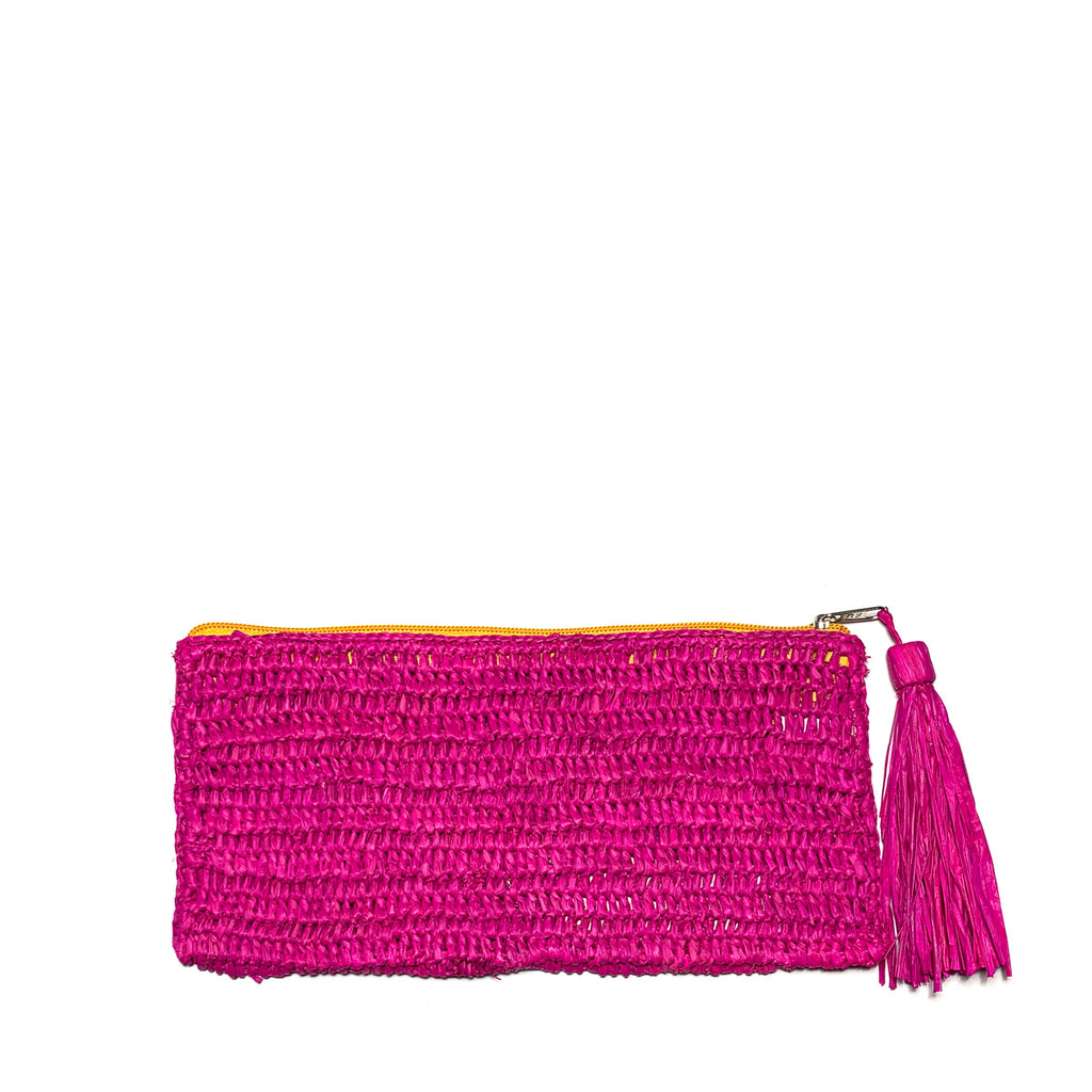 Pink colored crochet zip pouch with raffia tassel