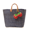 Hadley woven sisal beach tote in Navy with strawberry pom pom charms and leather handles