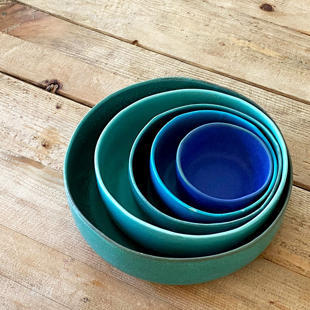 Nested set of green and blue stoneware bowls