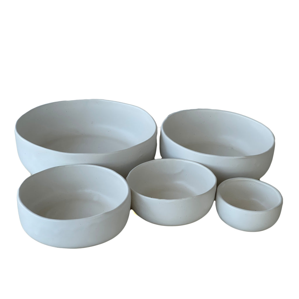 Set of white nesting stoneware bowls
