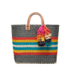 Dove colored, multi-colored striped basket tote with removable tassels and leather handles