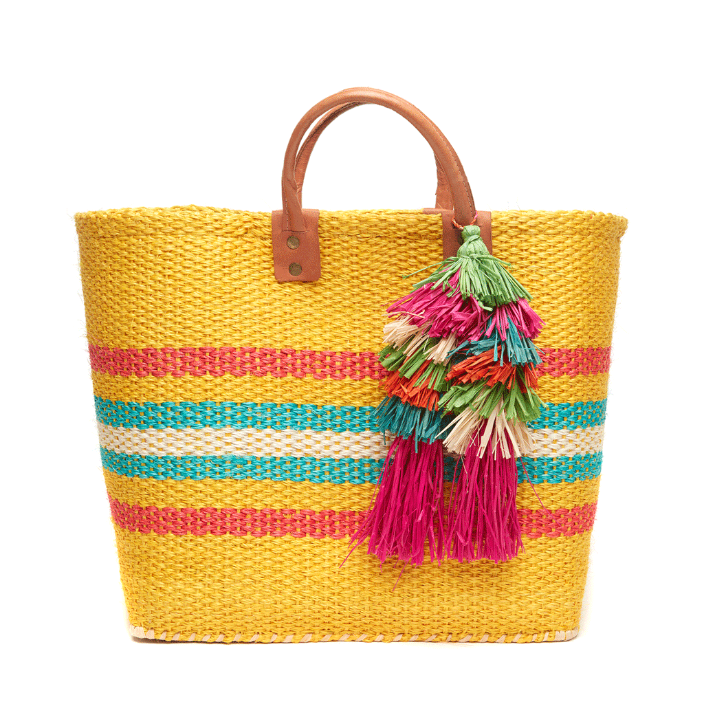La Paz Handwoven Sisal Beach Tote in Sunflower with leather handles and colorful raffia tassel