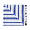 Folded white and blue striped beach blanket