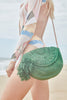 Crop of model on beach with Lila Emerald