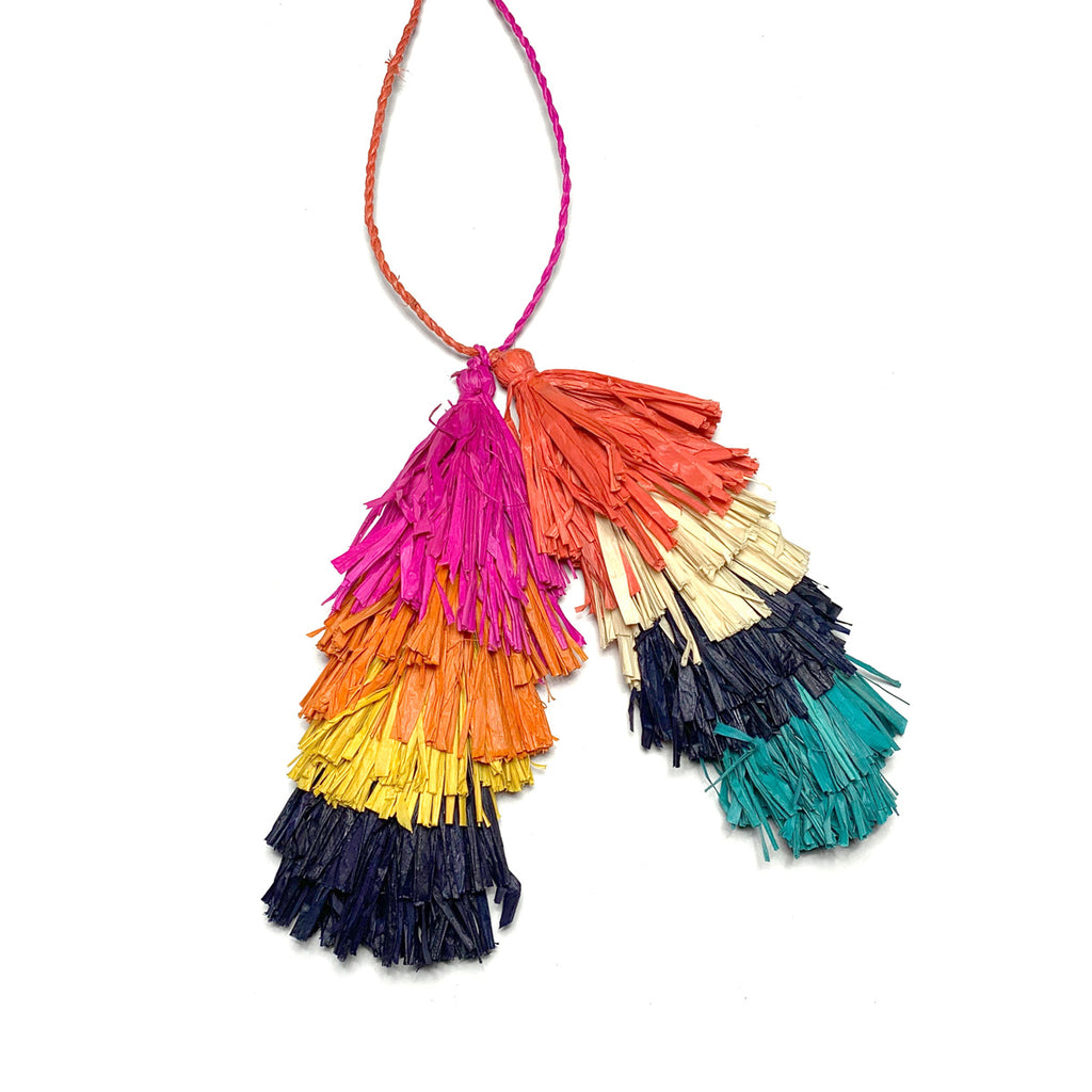 Handmade multi colored raffia double tassel as used on our Belo tote