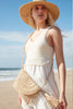 Model on beach wearing Naomi Natural