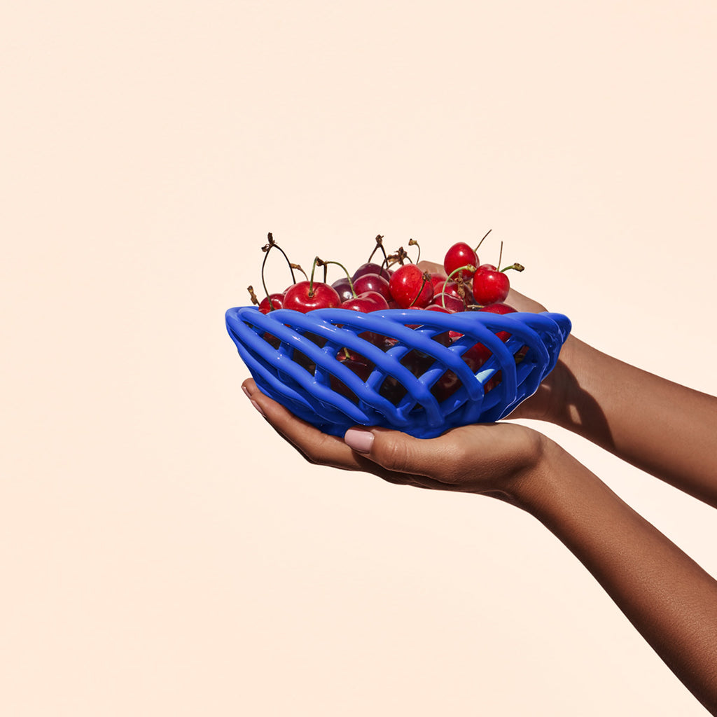 ceramic blue basket with cherries