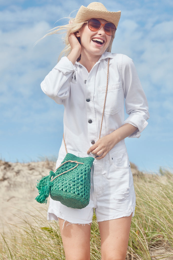 Model on beach wearing Odette Emerald