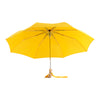 Open yellow umbrella with a duck head handle
