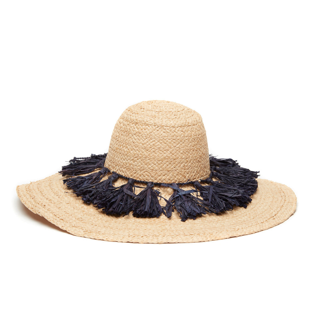 Wide brim braided raffia sun hat with a ring of navy colored tassels