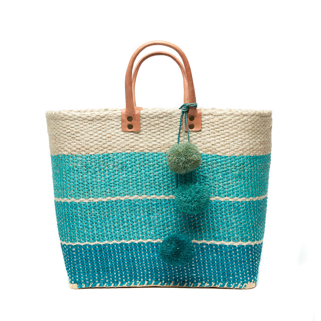 Three color aqua colored sisal basket tote with removable poms & leather handles