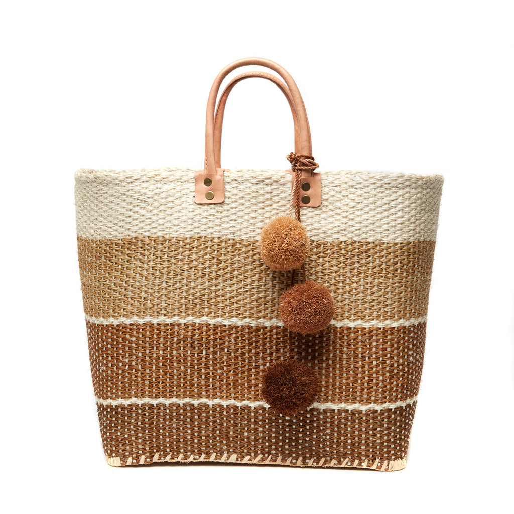 Three color sand colored sisal basket tote with removable poms & leather handles