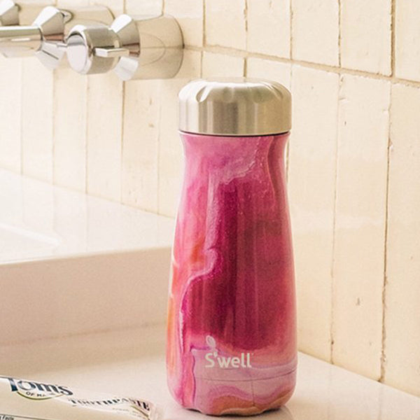Pink and red swirl design water bottle with silver lid