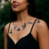 Model with Tattly Starling tattoos