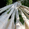 Close up of natural cotton hand-knotted hammock ties
