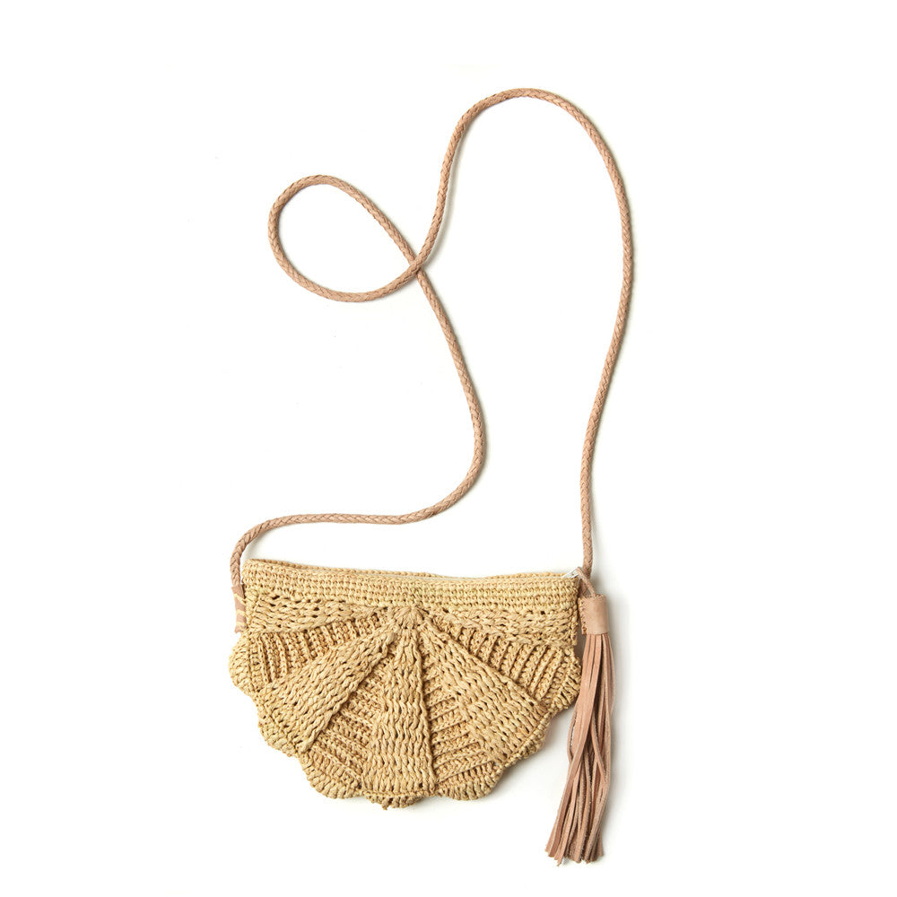 Natural colored crocheted raffia crossbody with cotton lining, zipper, leather strap & tassel